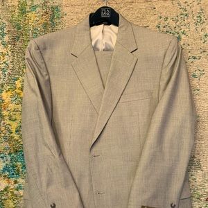 46 Regular, Traditional Cut, pleated front pants and single vent, never altered